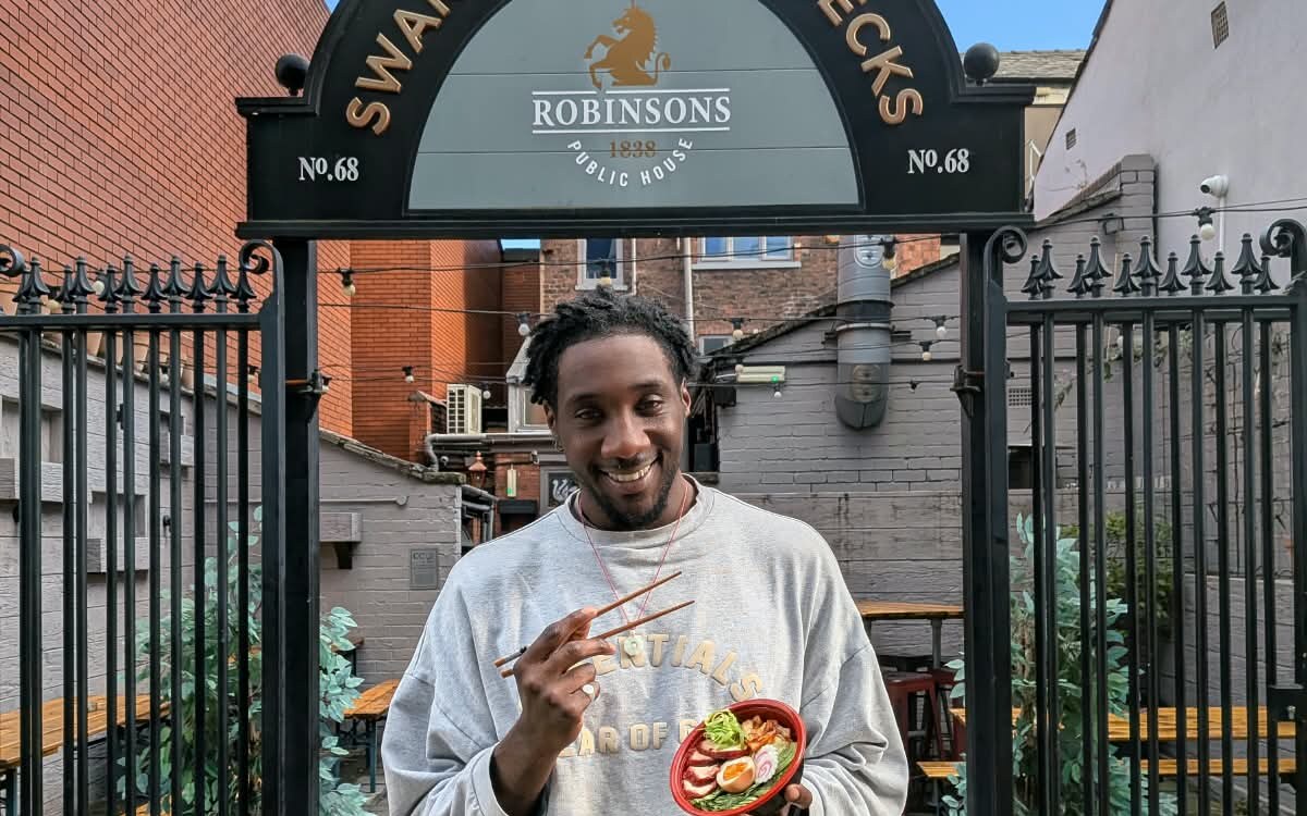 Guest enjoying Jefes ramen at Swan With Two Necks, Stockport