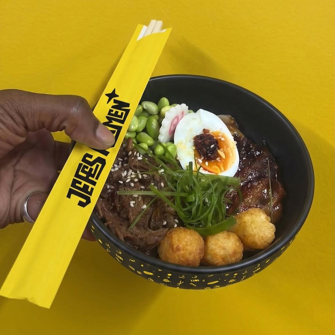 A Jefes Ramen bowl with branded chopsticks